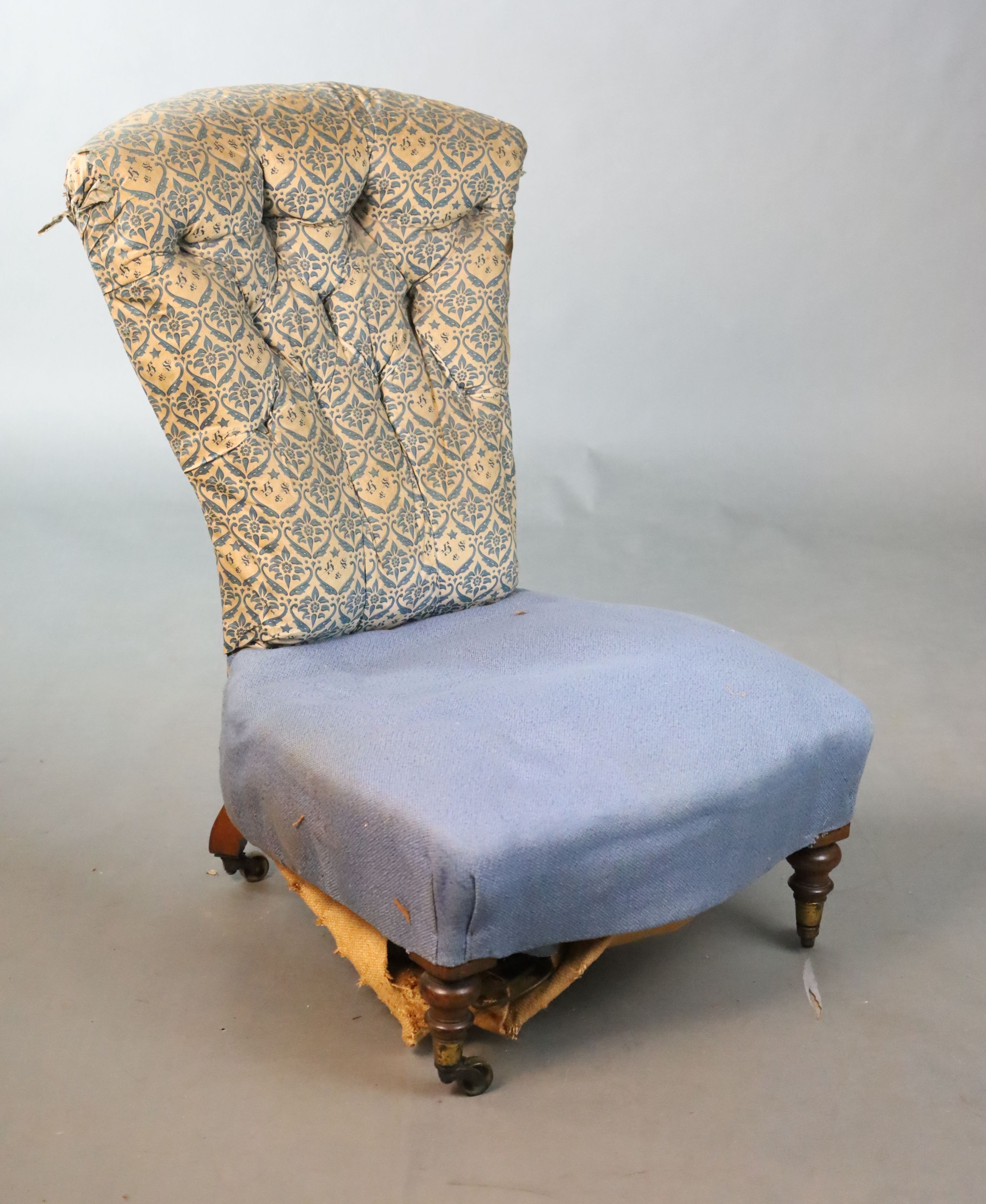 A Victorian Howard & Sons walnut buttoned back nursing chair, W.58.5cm D.81.5cm H.86.5cm